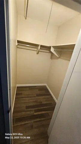 a view of a room with racks on the wall