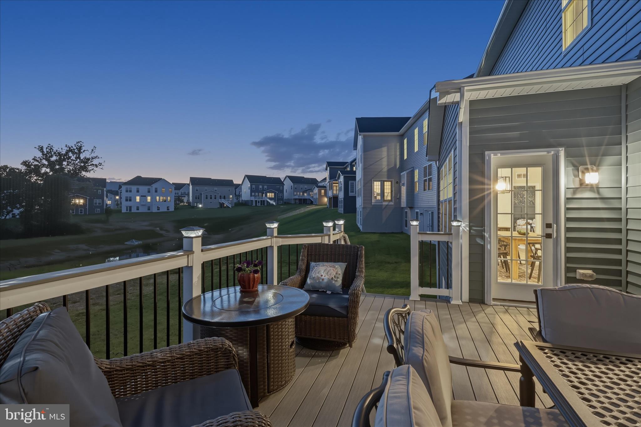 910 Enfield Farm Lane Brunswick, MD 21716 - Photo 57 of 87 a view of a balcony with two chairs and a table