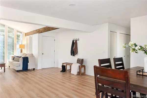 a living room with furniture fireplace and flat screen tv