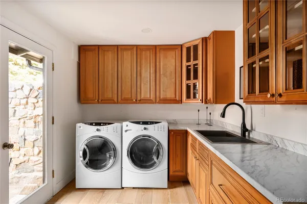 a view of a backyard with large tree