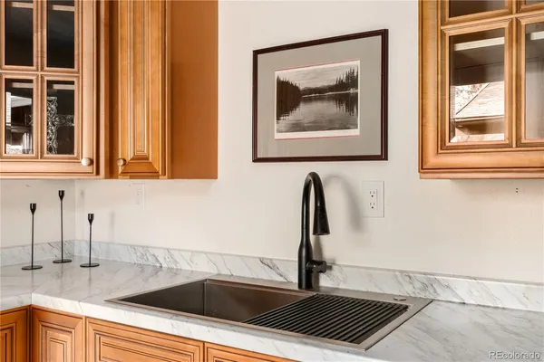a view of a two chairs in the balcony