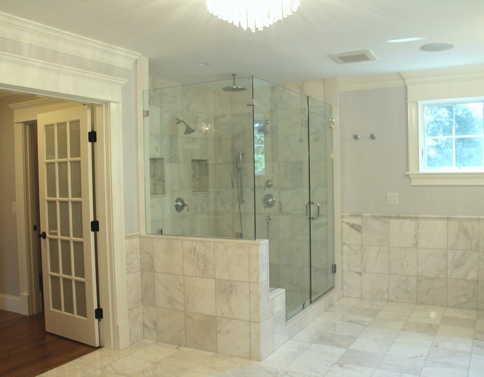 8 Burnham Road Lexington, MA 02420 - Photo 18 of 22 a bathroom with a shower