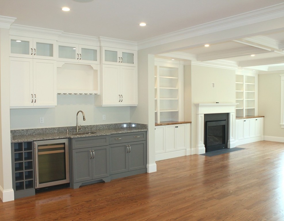 8 Burnham Road Lexington, MA 02420 - Photo 3 of 22 a large kitchen with stainless steel appliances granite countertop a stove and a sink