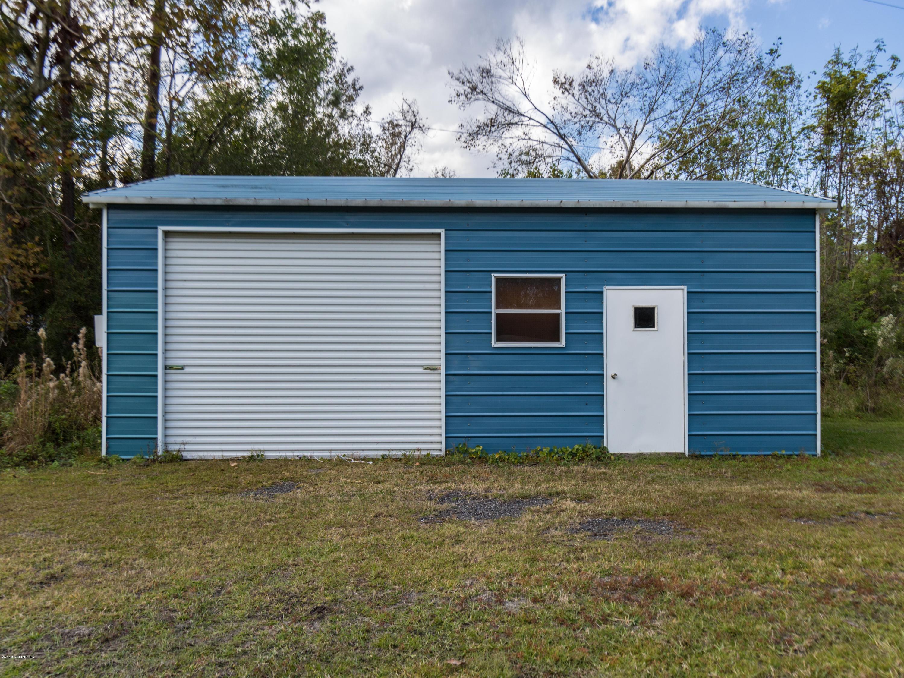 185 Brickyard Road Middleburg, FL 32068 - Photo 54 of 54 a view of a house with a yard