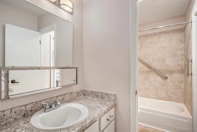 a bathroom with a sink and a bathtub
