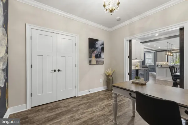 a view of a bathroom from the hallway