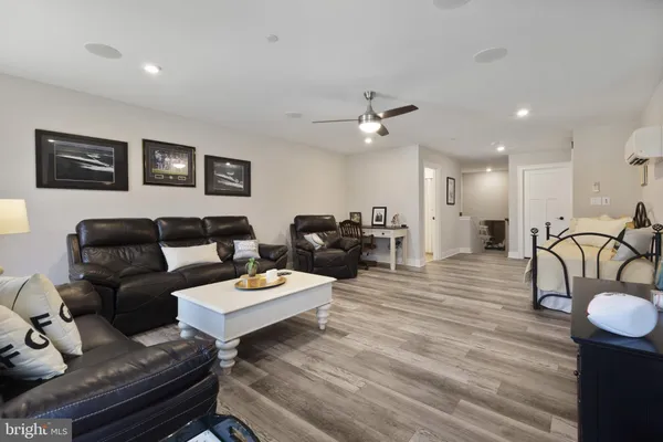 a living room with furniture and a table