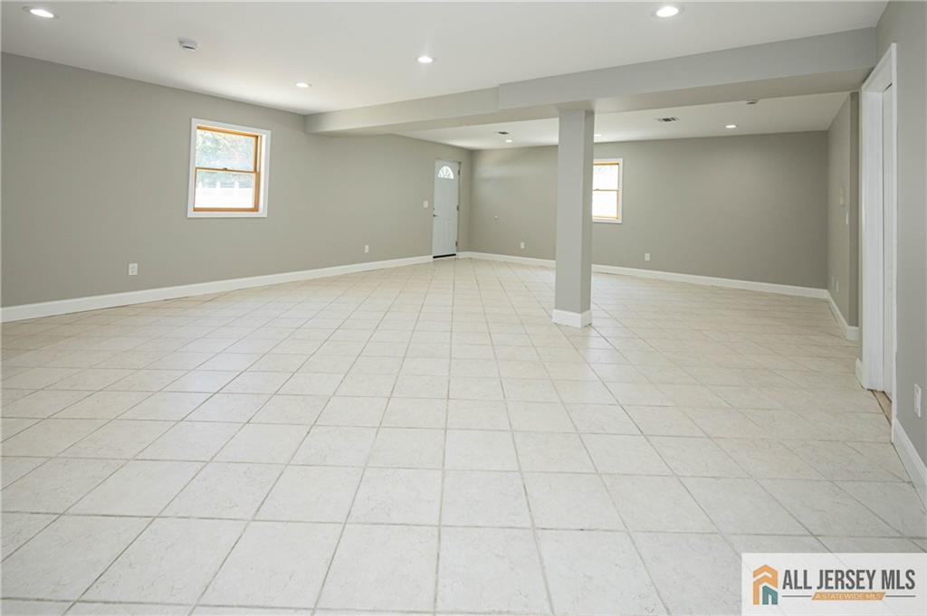 278 Rector Street Perth Amboy, NJ 08861 - Photo 33 of 47 an empty room with natural light and window