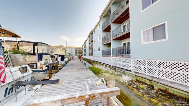 a view of balcony and deck with wooden floor
