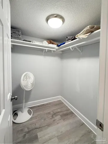 a bathroom with a light fixture and a sink