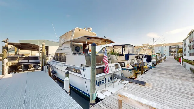 a view of a house with wooden deck
