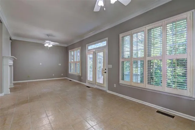 a kitchen with stainless steel appliances granite countertop a stove a microwave and a refrigerator