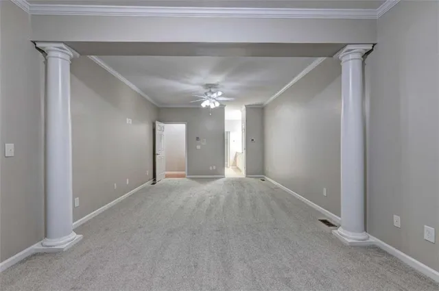 a view of a closet area with wooden floor