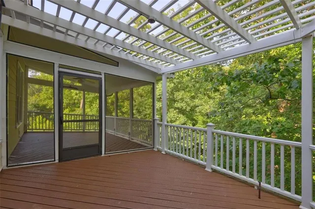 a view of a room with wooden walls
