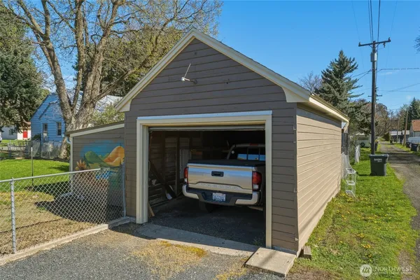 a view of a house with a back yard