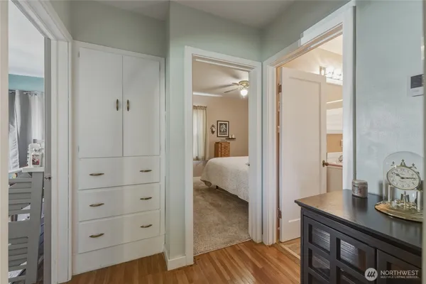 a view of a bedroom from a hallway