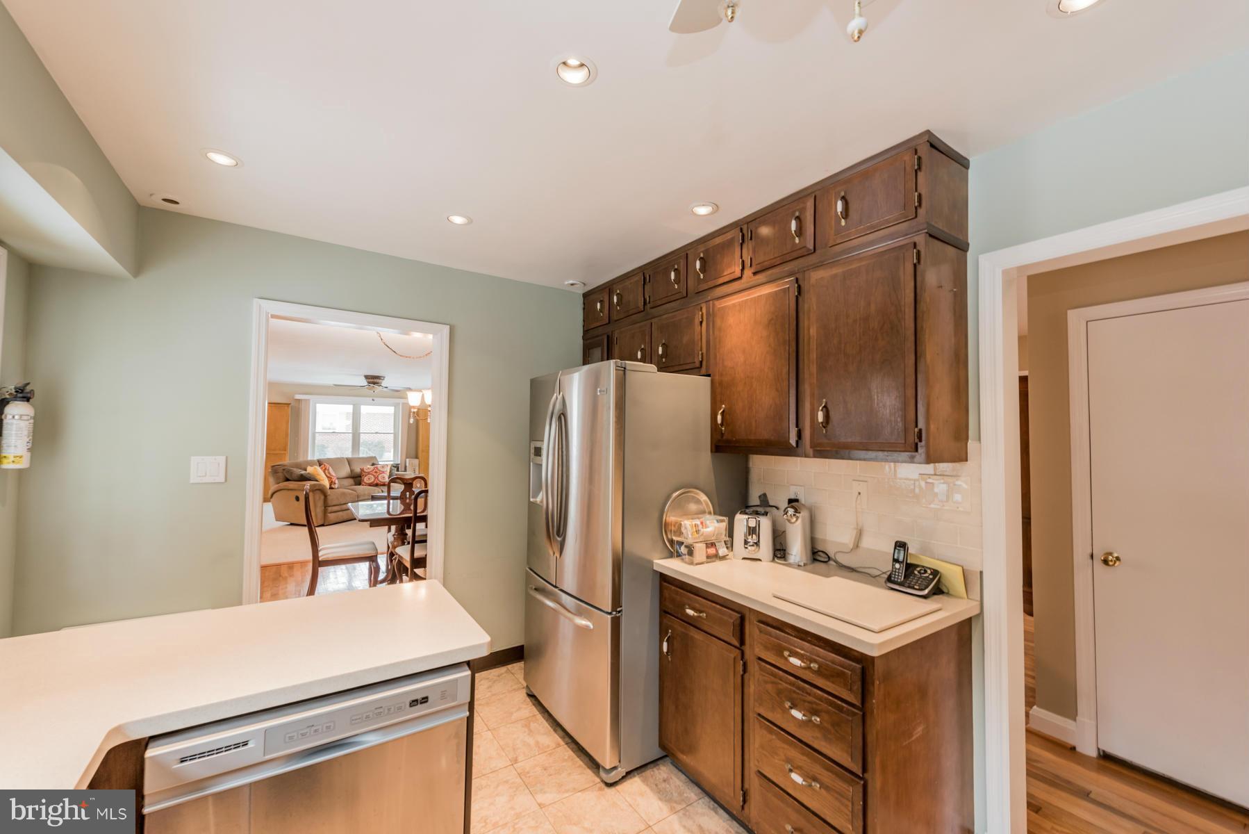 1210 Belfast Road Sparks, MD 21152 - Photo 11 of 29 a kitchen with a refrigerator and a sink
