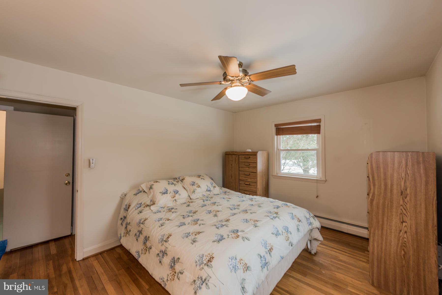 1210 Belfast Road Sparks, MD 21152 - Photo 18 of 29 a bedroom with a bed and a window