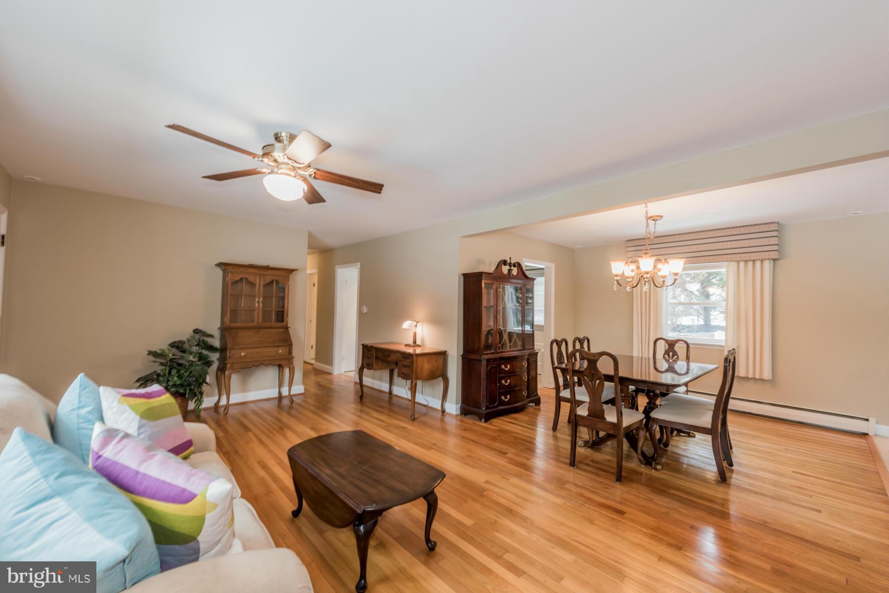 1210 Belfast Road Sparks, MD 21152 - Photo 2 of 29 a living room with furniture and wooden floor