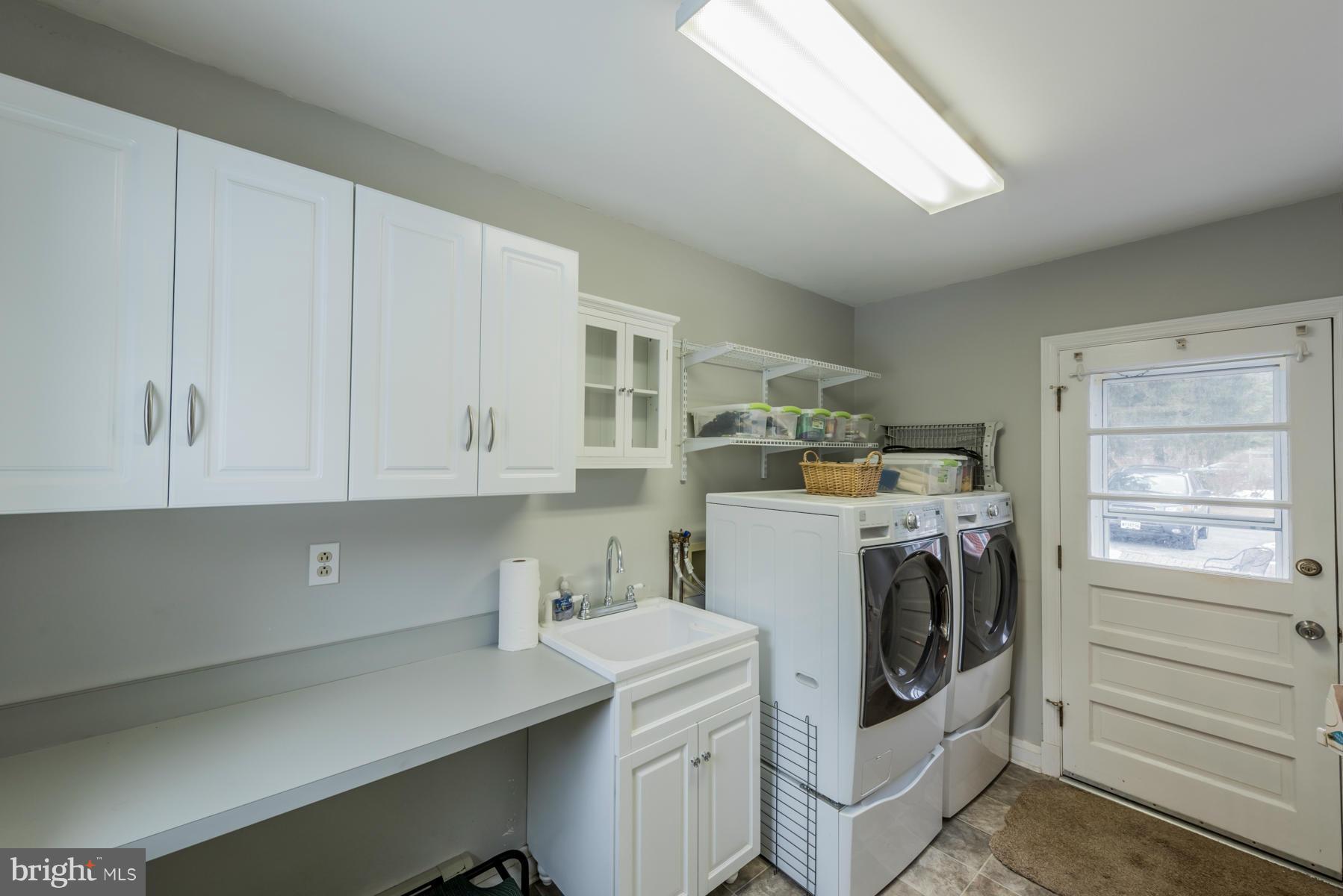 1210 Belfast Road Sparks, MD 21152 - Photo 26 of 29 a utility room with dryer and washer