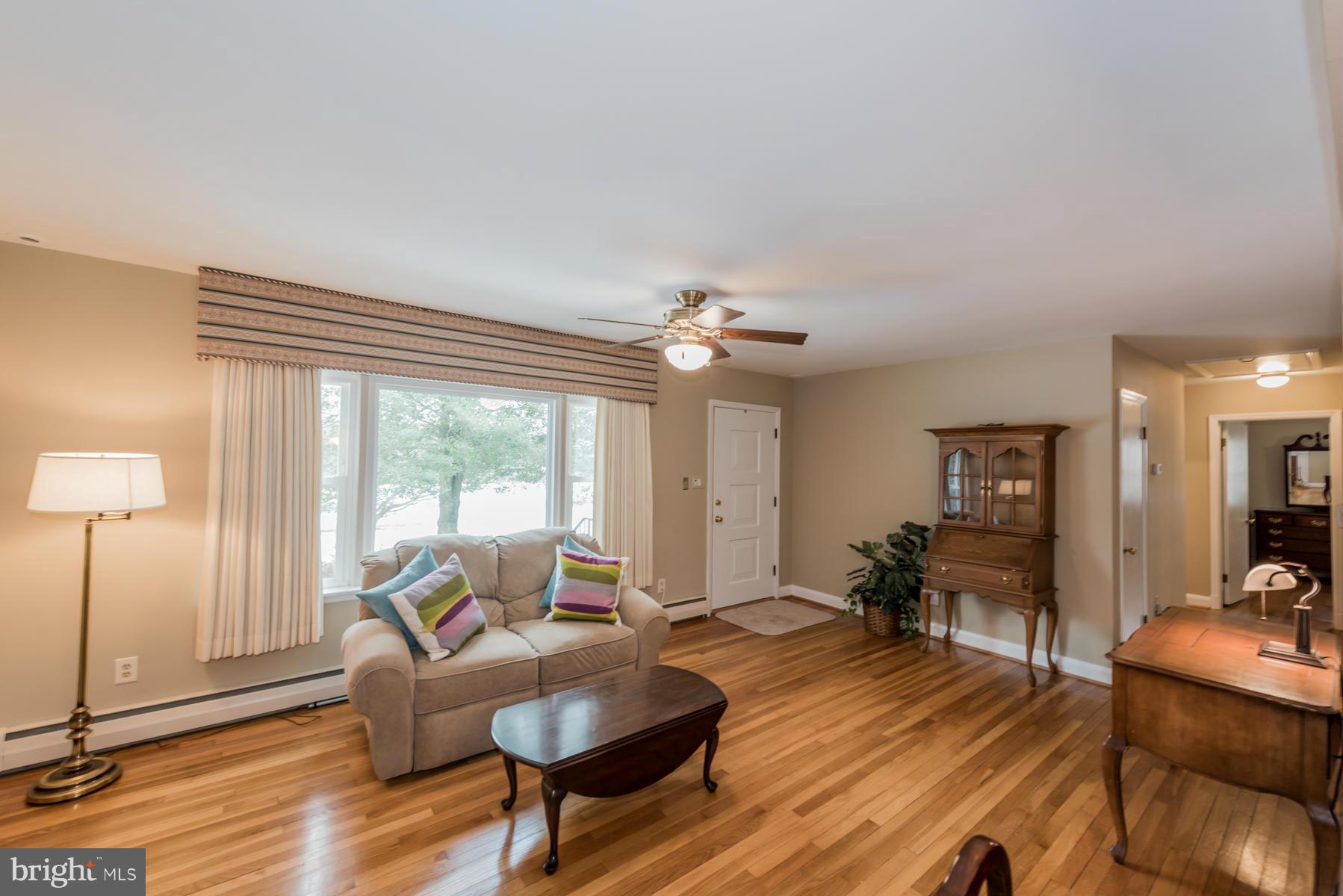 1210 Belfast Road Sparks, MD 21152 - Photo 4 of 29 a living room with furniture and a large window