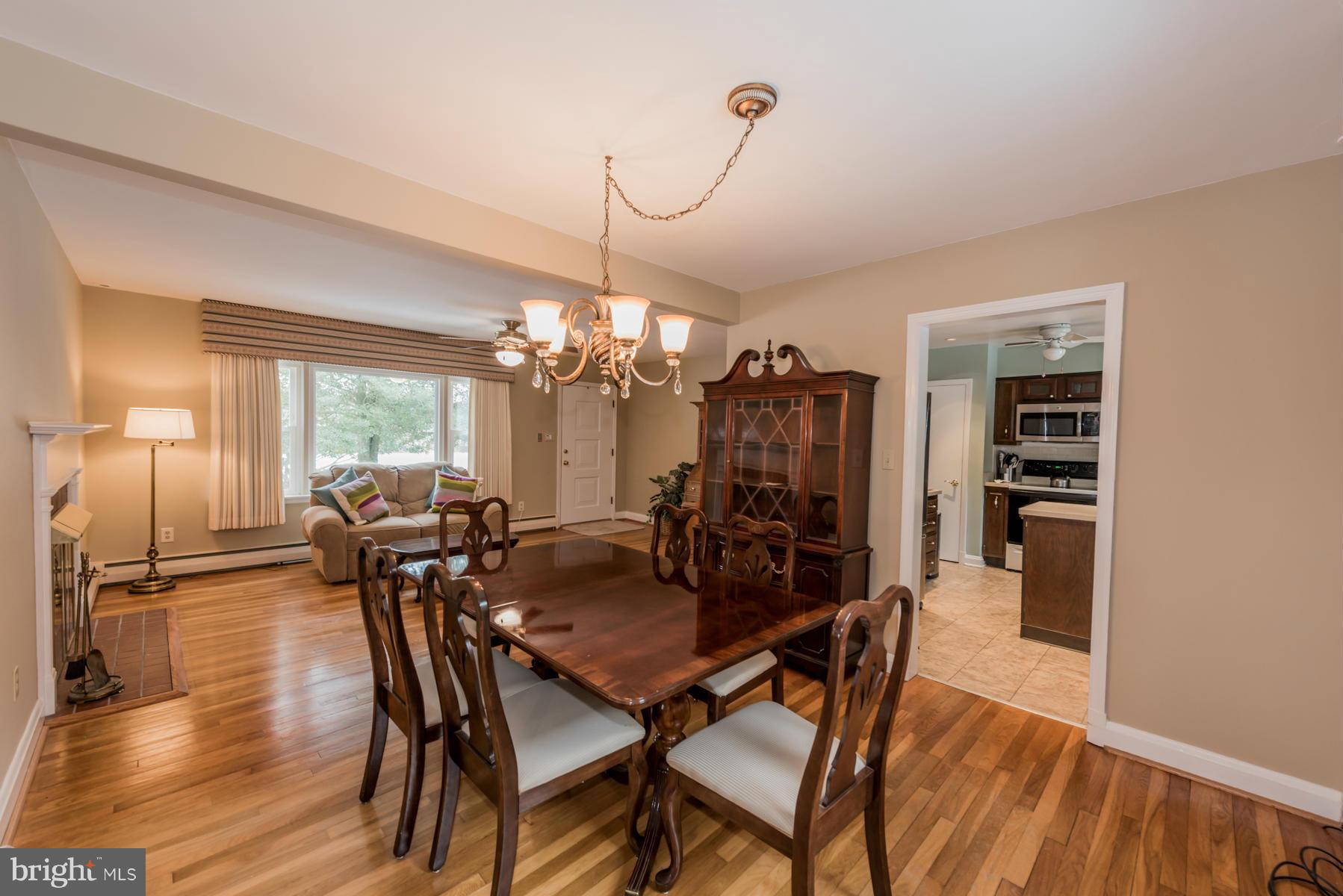 1210 Belfast Road Sparks, MD 21152 - Photo 5 of 29 a view of a dining room with furniture and wooden floor