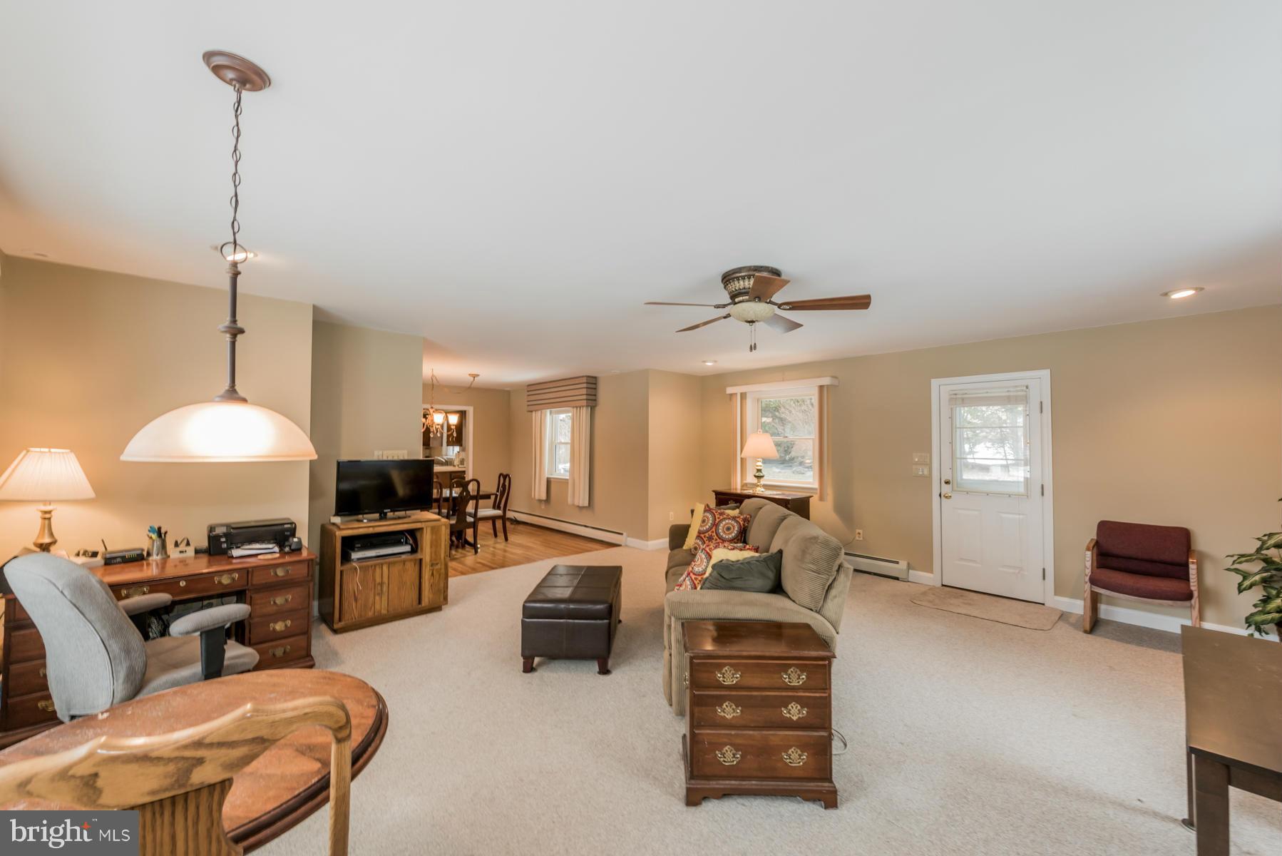 1210 Belfast Road Sparks, MD 21152 - Photo 8 of 29 a living room with furniture a ceiling fan and a window