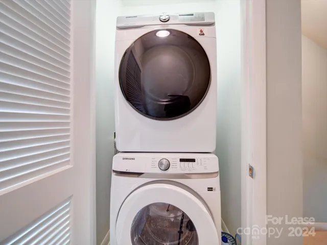 a view of a hallway with a window
