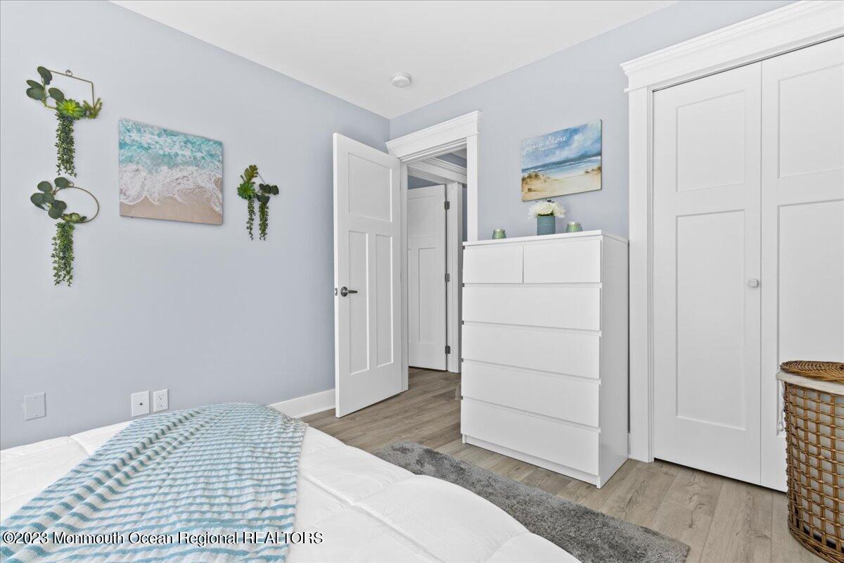 15 Dune Terrace, Unit 15B Seaside Heights, NJ 08751 - Photo 14 of 22 a view of a bedroom with furniture and cabinet