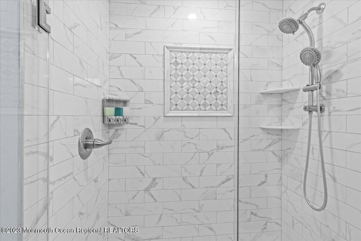 15 Dune Terrace, Unit 15B Seaside Heights, NJ 08751 - Photo 19 of 22 a bathroom with shower