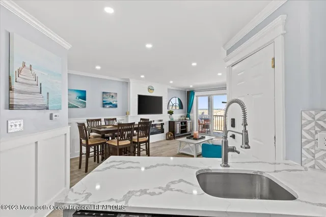 a view of kitchen and dining area with furniture