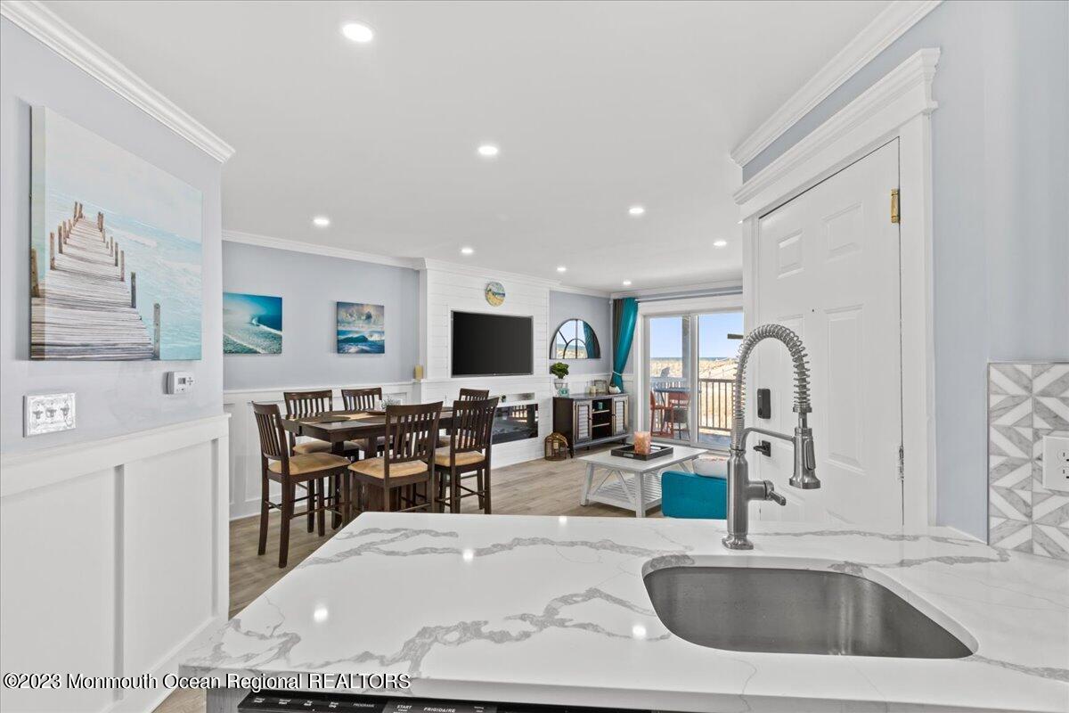 15 Dune Terrace, Unit 15B Seaside Heights, NJ 08751 - Photo 10 of 22 a view of kitchen and dining area with furniture