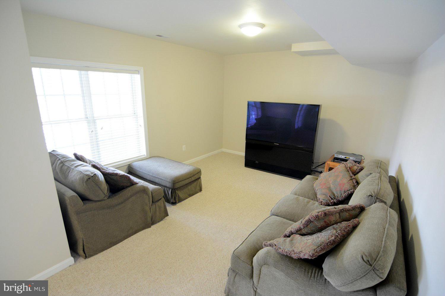 13242 Braddock Road Clifton, VA 20124 - Photo 23 of 30 lower level rec room