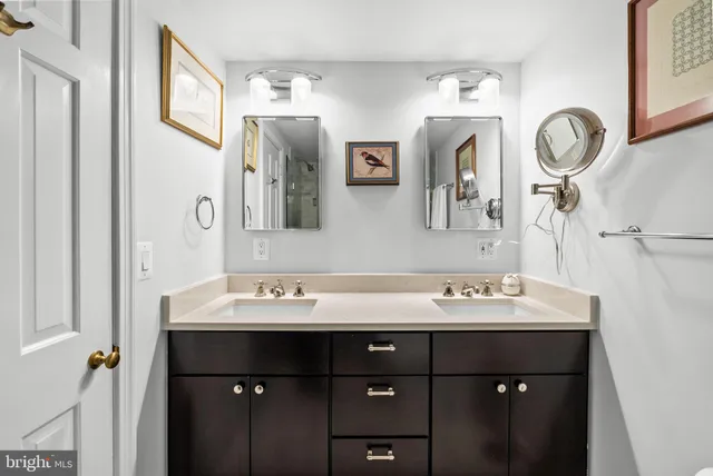 a bathroom with a shower and a sink