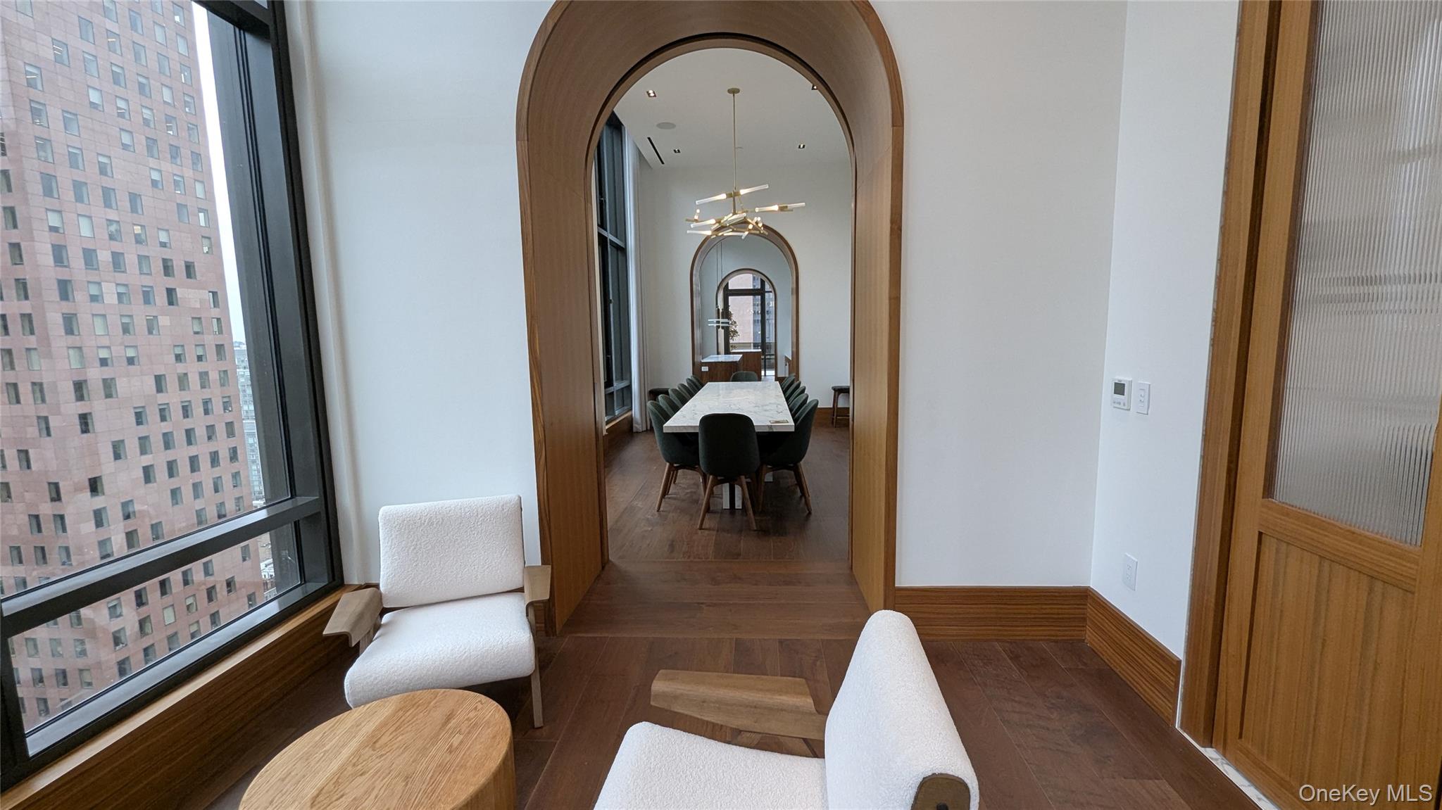 135 East 47th Street, Unit 21A Manhattan, NY 10017 - Photo 11 of 21 a view of living room and bathroom