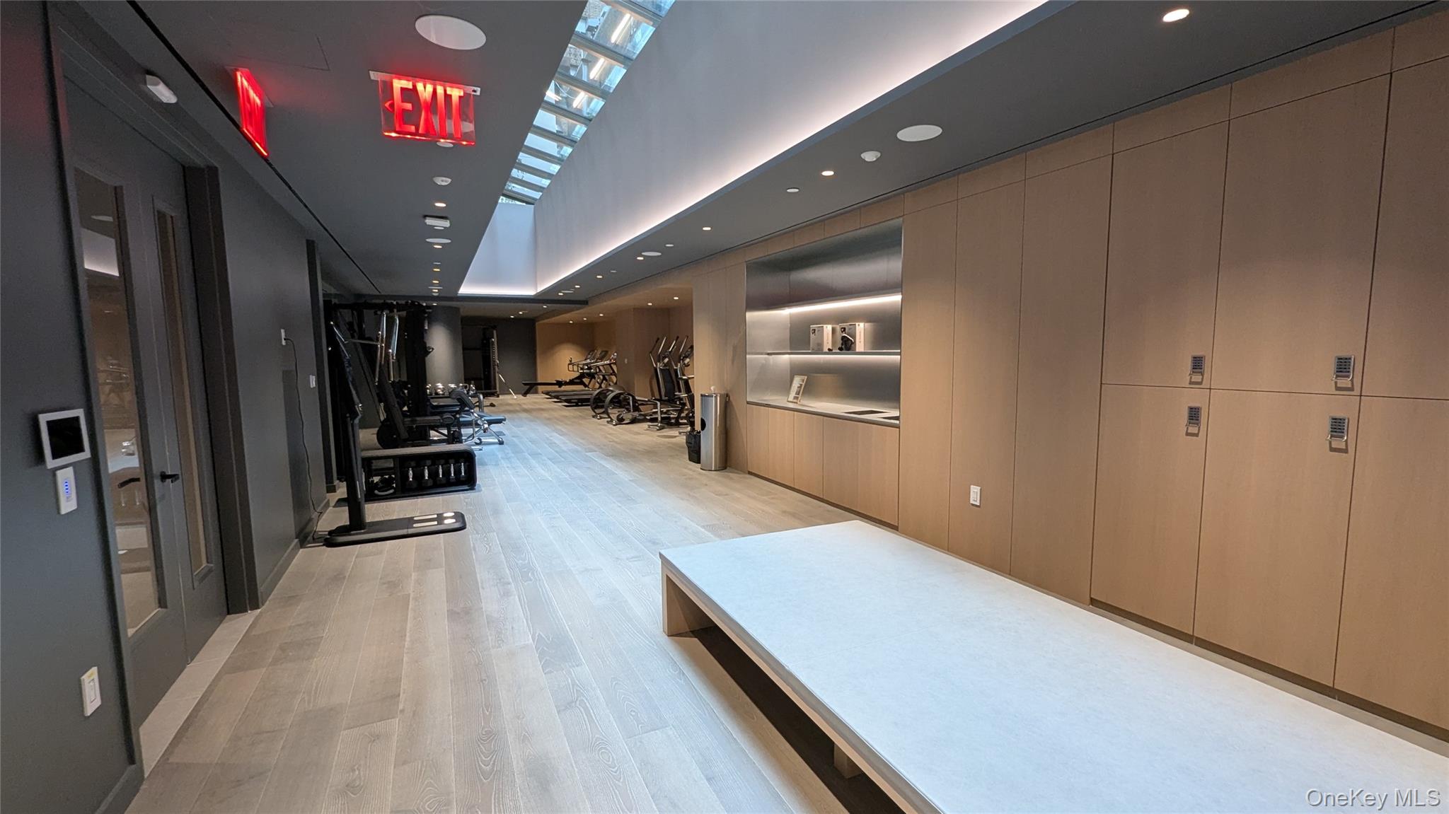 135 East 47th Street, Unit 21A Manhattan, NY 10017 - Photo 19 of 21 a view of a hallway with wooden floor