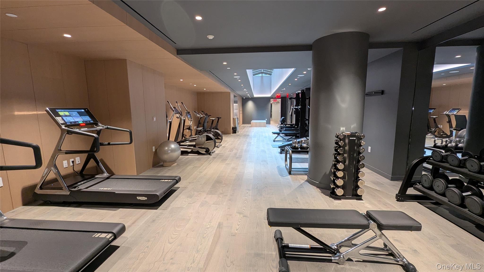 135 East 47th Street, Unit 21A Manhattan, NY 10017 - Photo 20 of 21 a view of a room with gym equipment