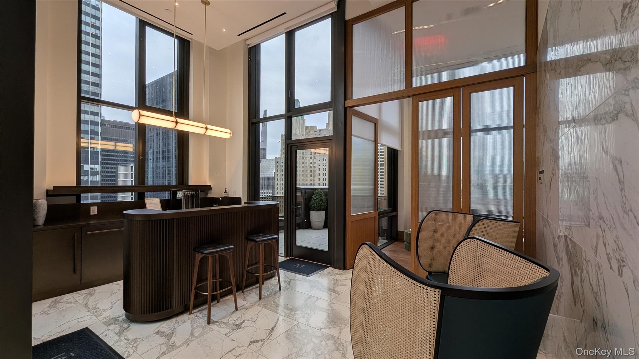 135 East 47th Street, Unit 21A Manhattan, NY 10017 - Photo 10 of 21 a room with furniture and window