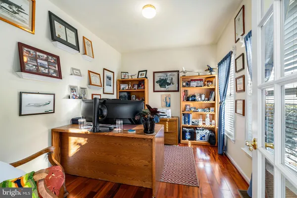 a view of a workspace with furniture and workspace