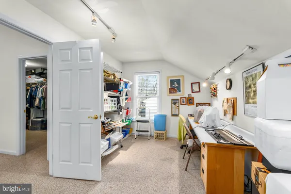 a view of a workspace with furniture