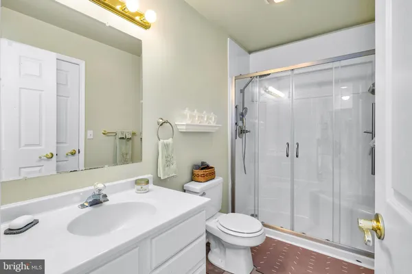 a view of parking garage with cars and a garage