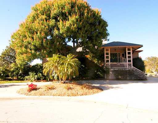 Undisclosed Address Stuart, FL 34997 - Photo 2 of 10 a view of a house with a yard
