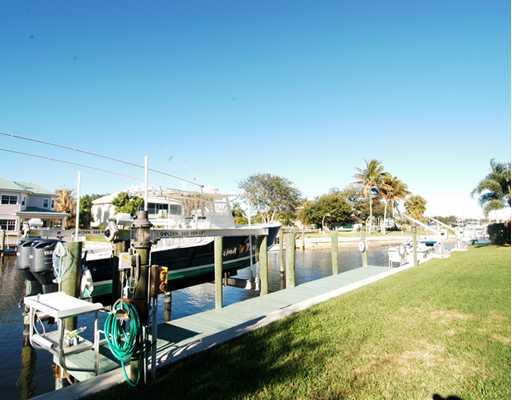 Undisclosed Address Stuart, FL 34997 - Photo 8 of 10 a view of a chairs and table on the terrace