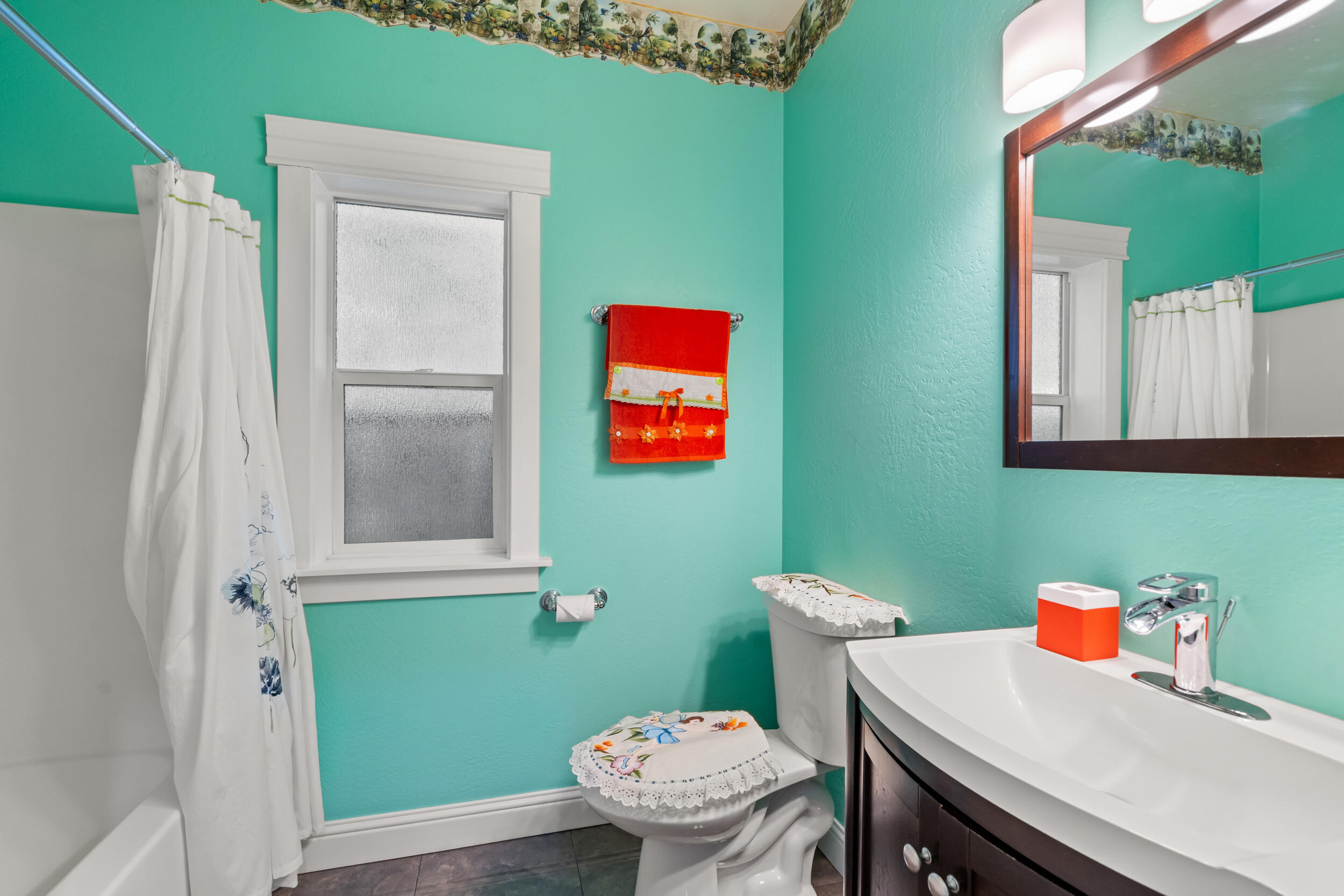 1227 Lithia Way Talent, OR 97540 - Photo 24 of 37 a bathroom with a sink and a mirror