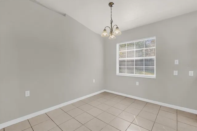 en empty room with windows