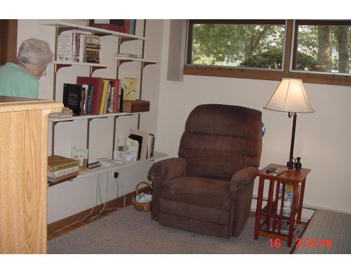 40 Winding Lane Springfield, MA 01118 - Photo 13 of 15 a living room with furniture and a window