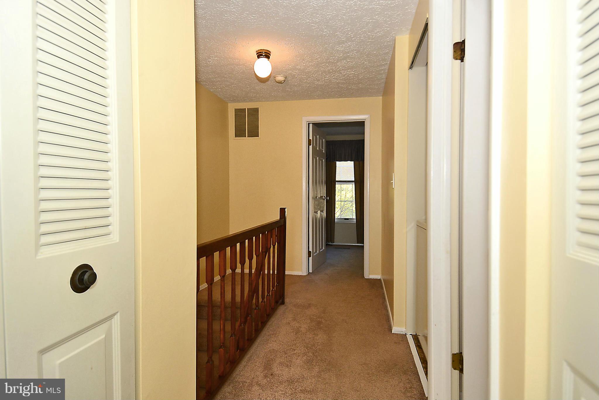 18 Cross Ridge Court Germantown, MD 20874 - Photo 18 of 30 Hallway on the upper level