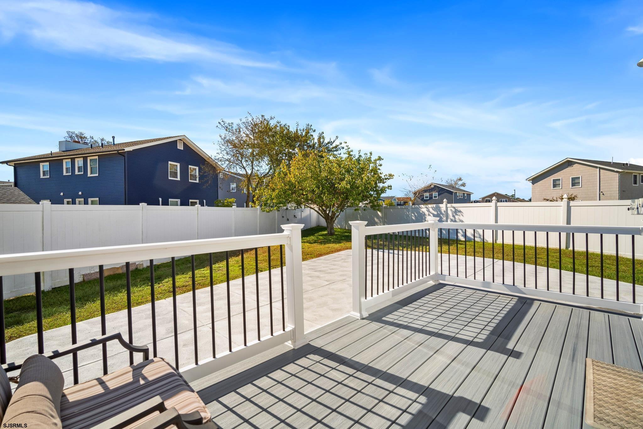 7 A Lighthouse Cove, Unit A Brigantine, NJ 08203 - Photo 24 of 31 a view of a balcony with wooden floor