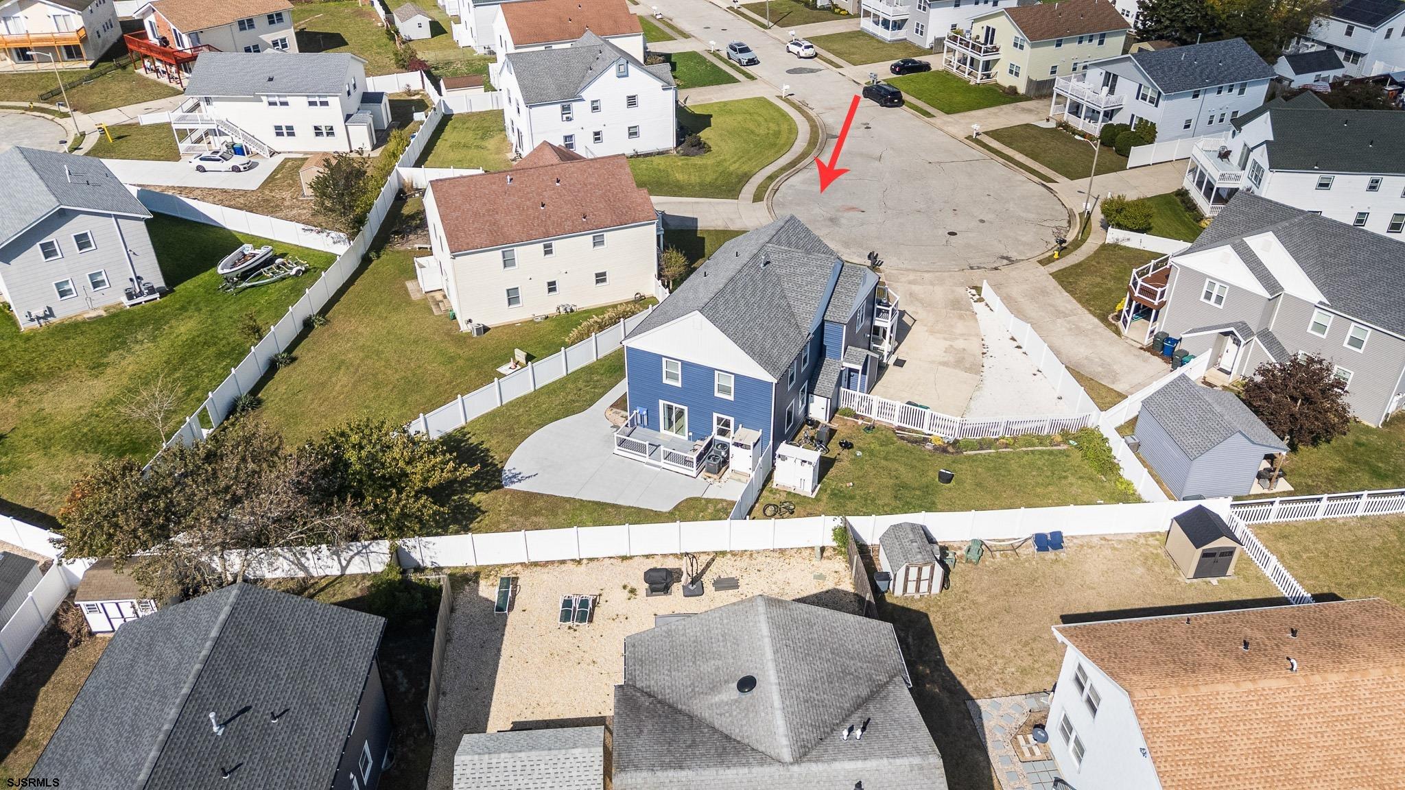 7 A Lighthouse Cove, Unit A Brigantine, NJ 08203 - Photo 26 of 31 an aerial view of a house with a swimming pool