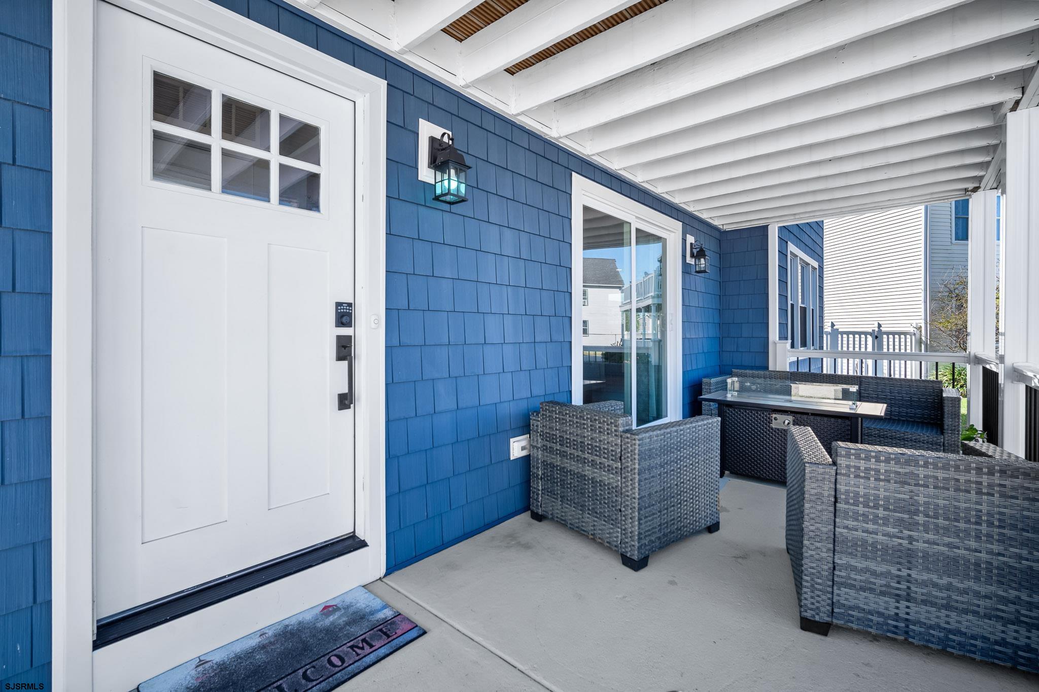 7 A Lighthouse Cove, Unit A Brigantine, NJ 08203 - Photo 6 of 31 a living room with furniture and windows